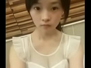 Cute chinese teen sparking above webcam